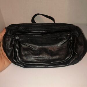Stylish Black Leather Fanny Pack in excellent shape. Passports, license, phone